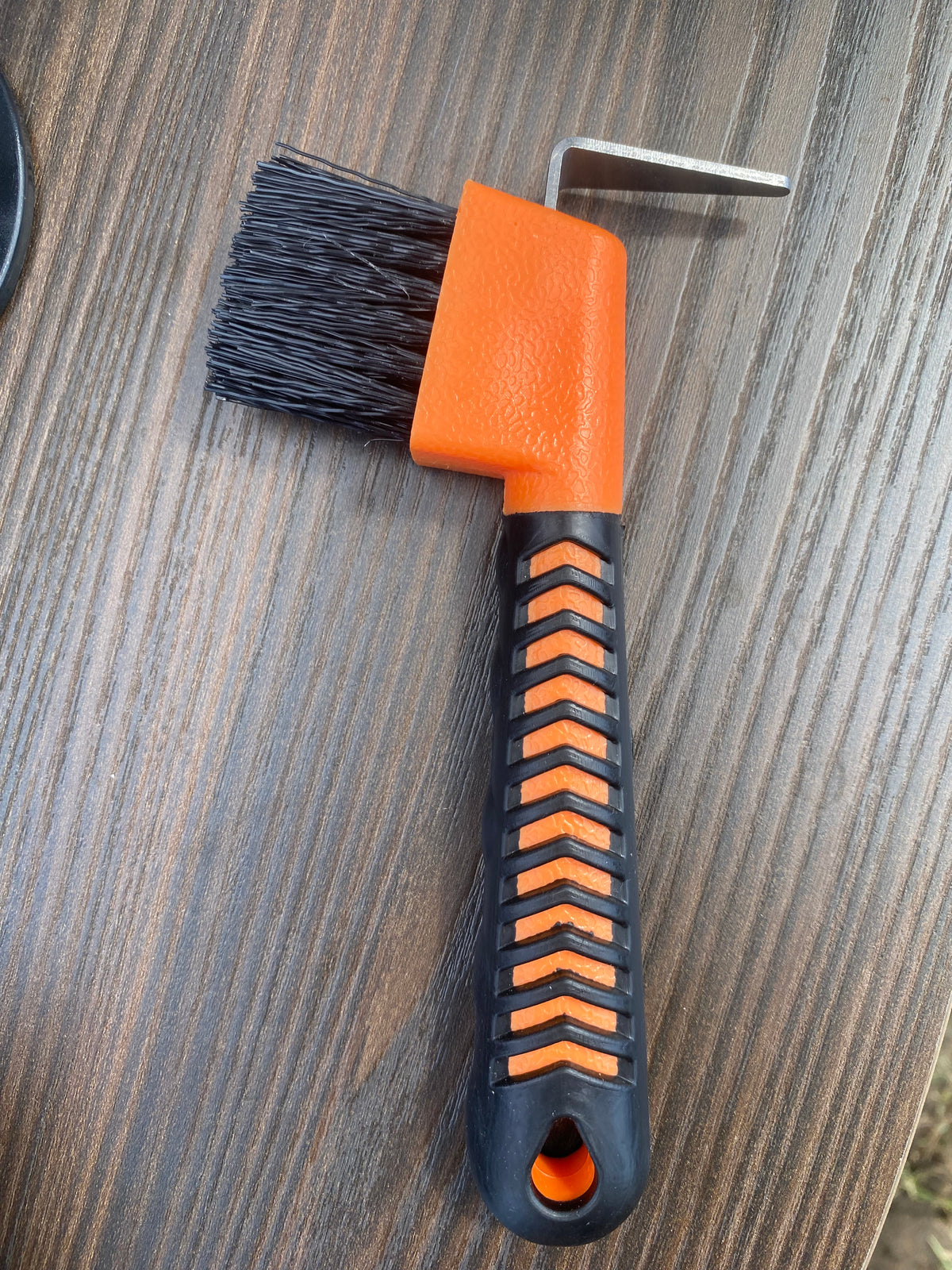 Rubber handle hoof pick