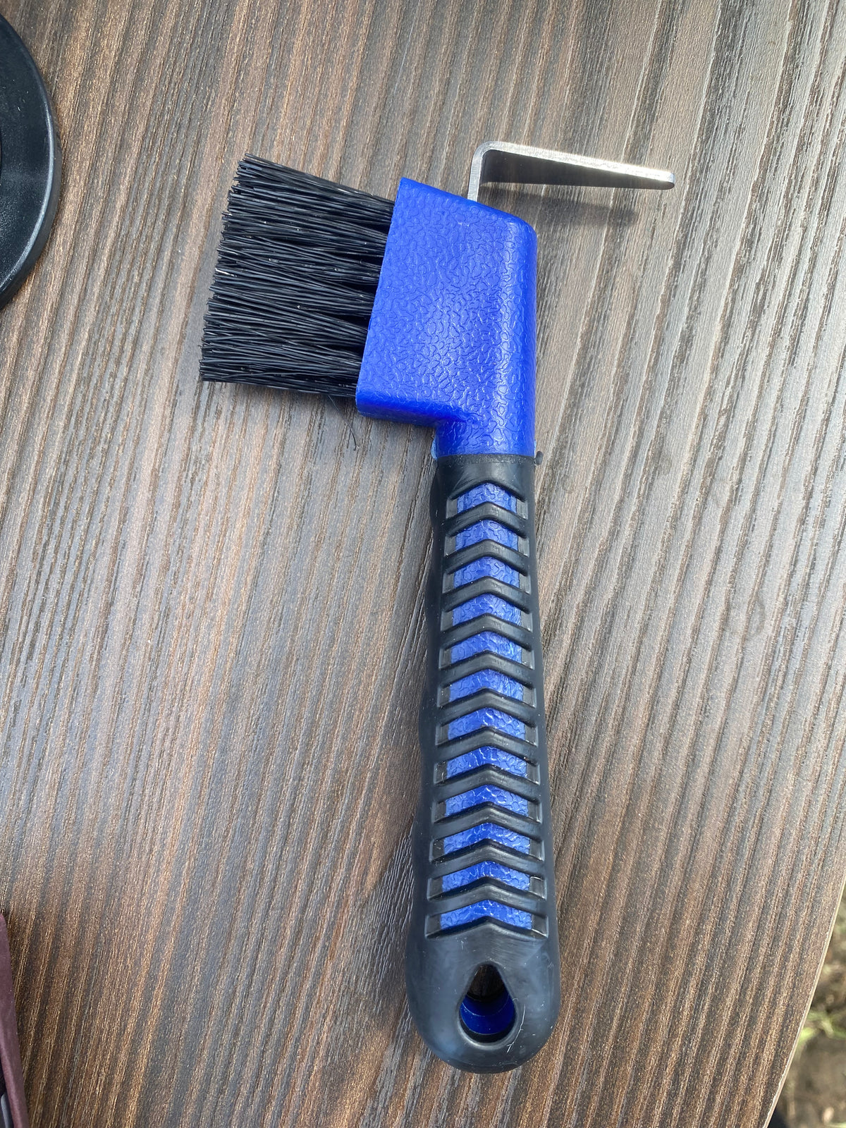 Rubber handle hoof pick