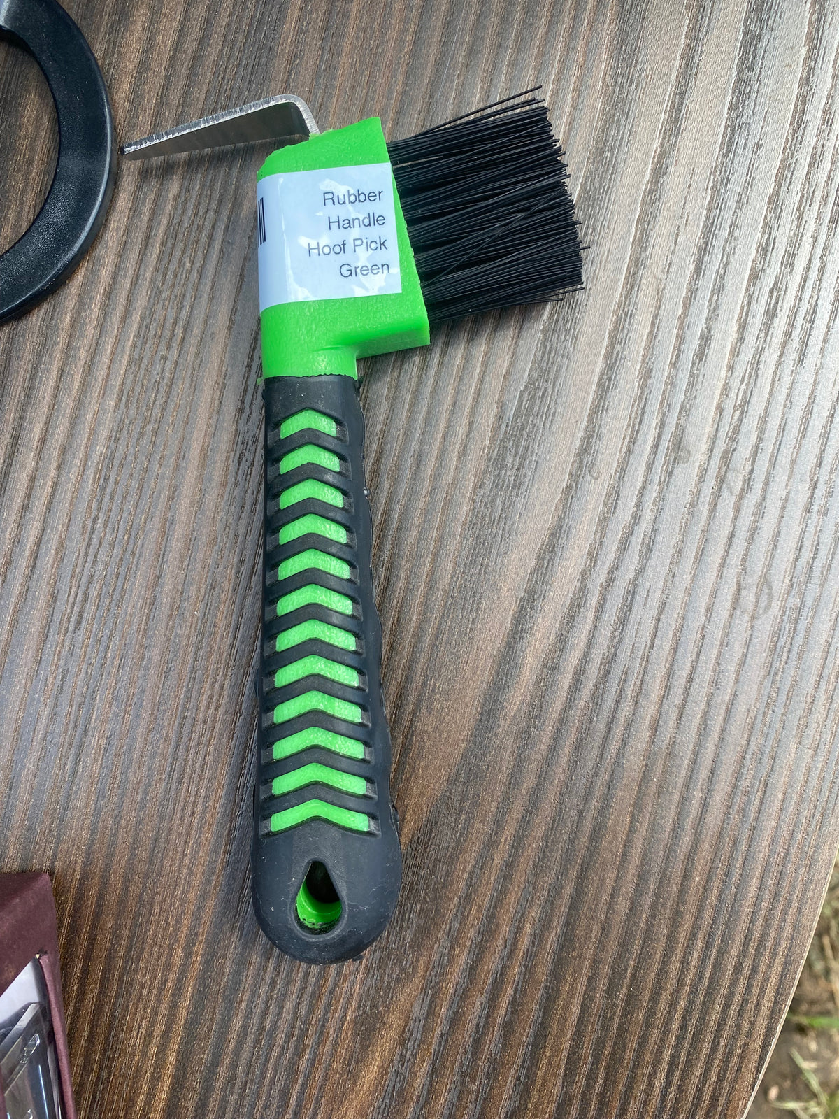 Rubber handle hoof pick