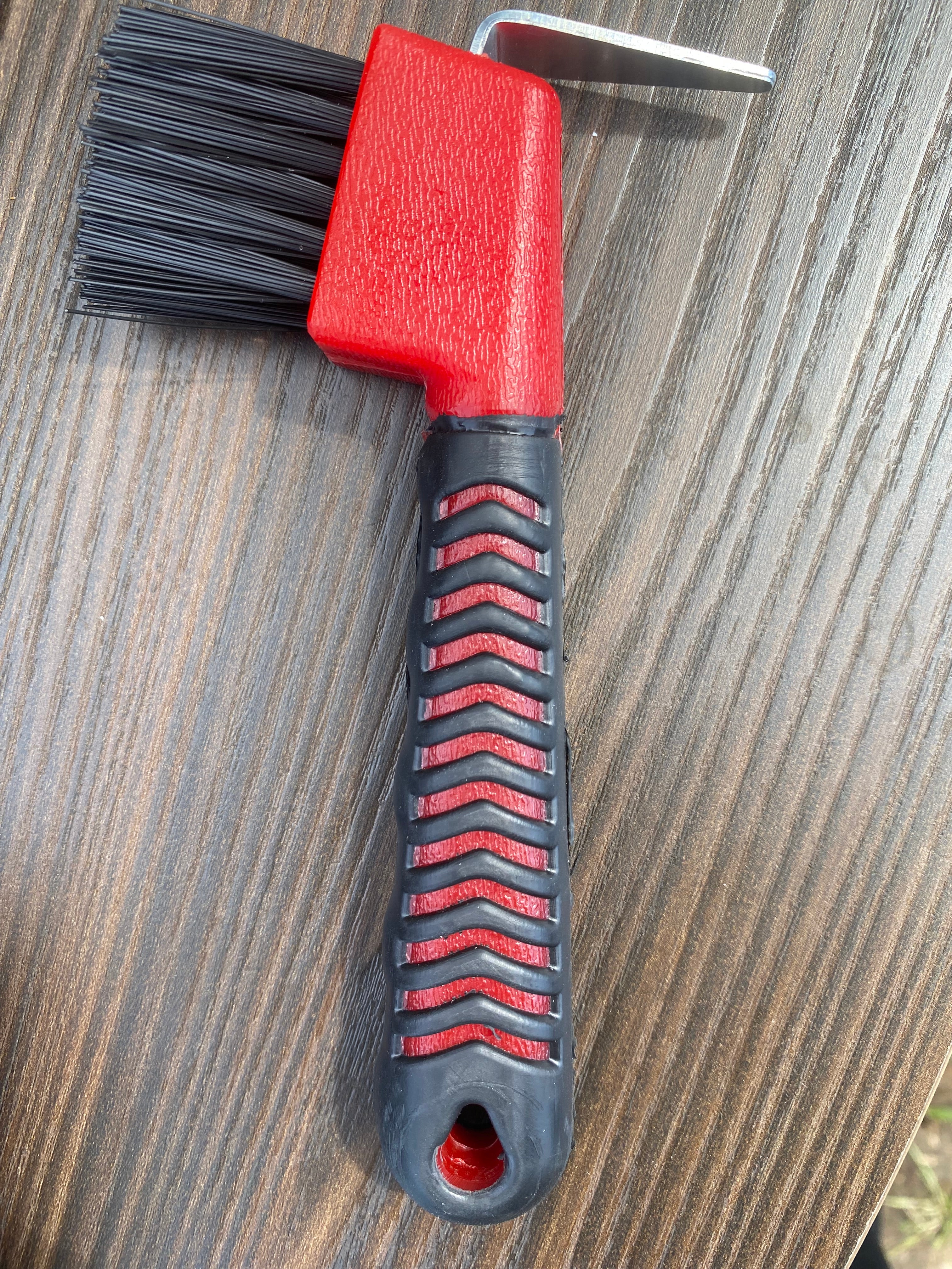 Rubber handle hoof pick